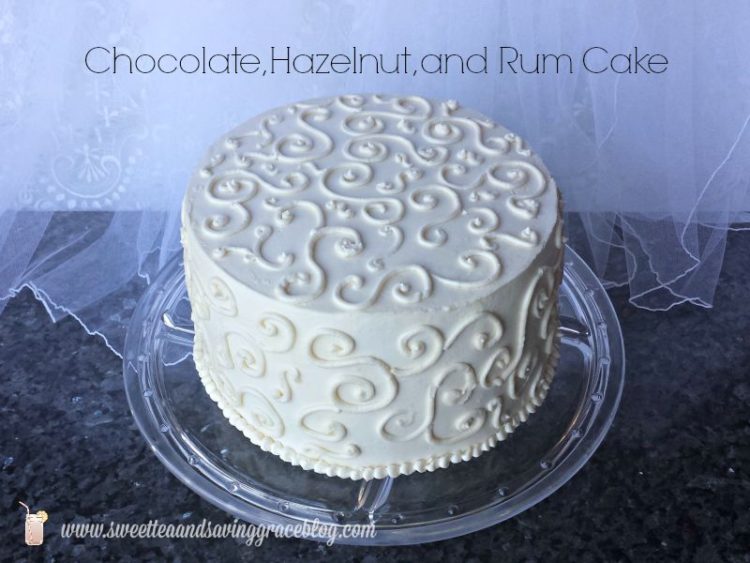 http://sweetteaandsavinggraceblog.com/chocolate-hazelnut-rum-cake/